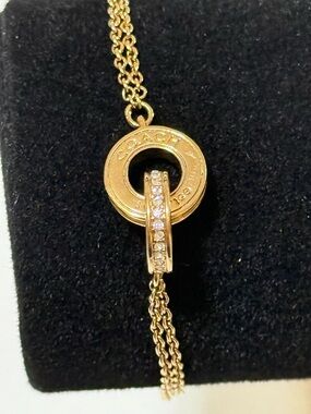 Coach Gold-Tone Circle Pendant Necklace with Crystal Accent